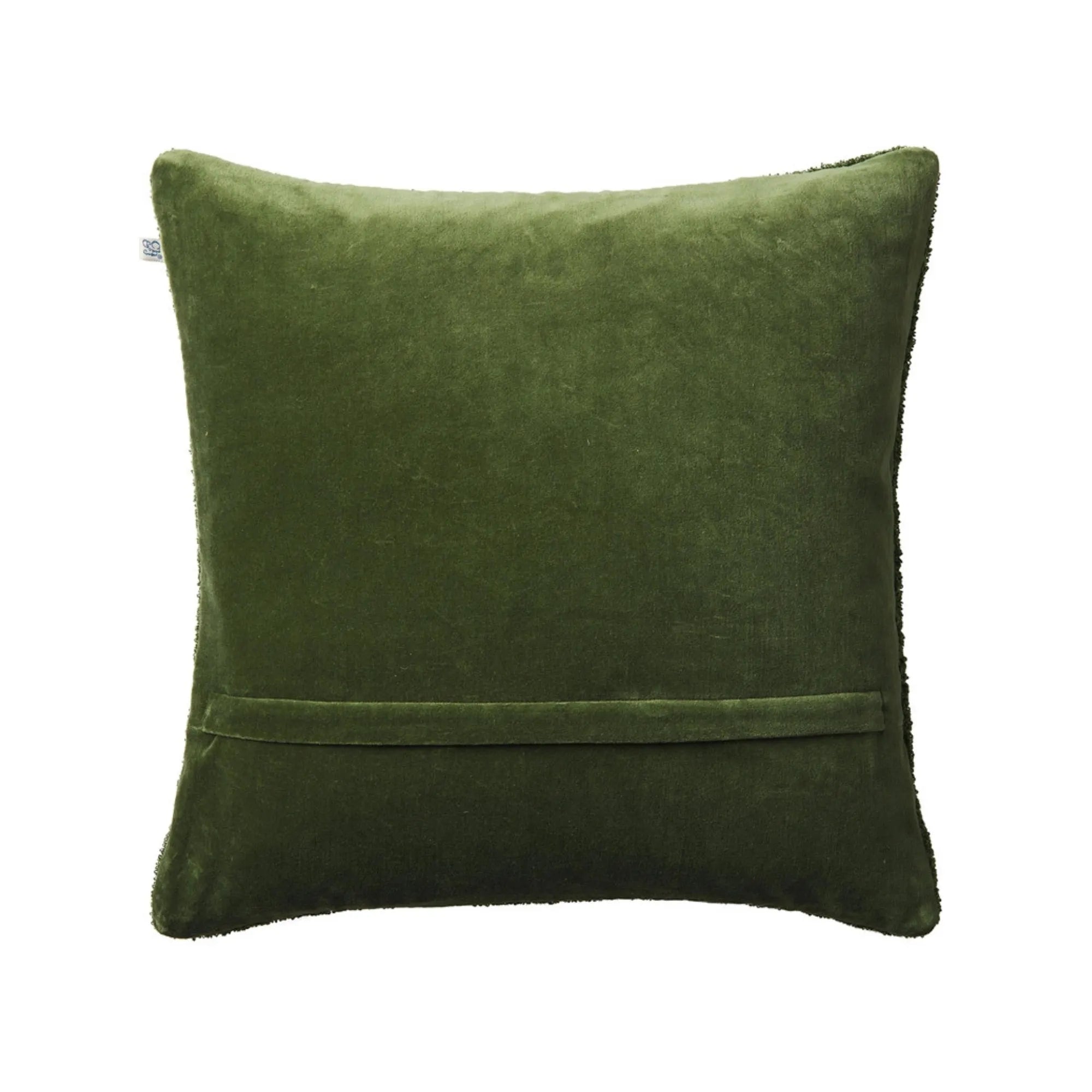 Interior setting featuring the Mohan Boucle Cushion in Cactus Green and Green, adding a pop of color and comfort to a living space