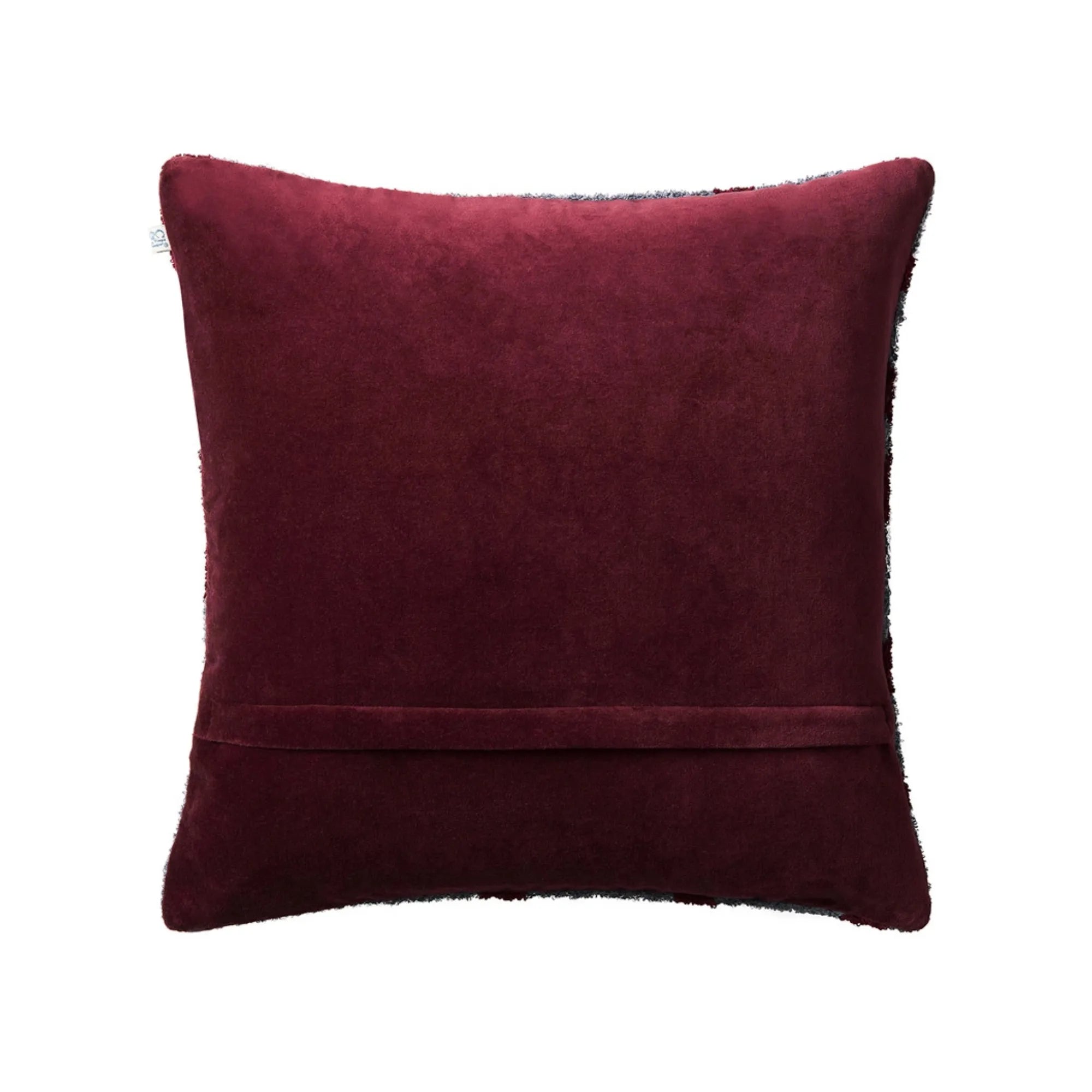 Decorative cushion pillow with textured boucle fabric in dusty blue and ruby