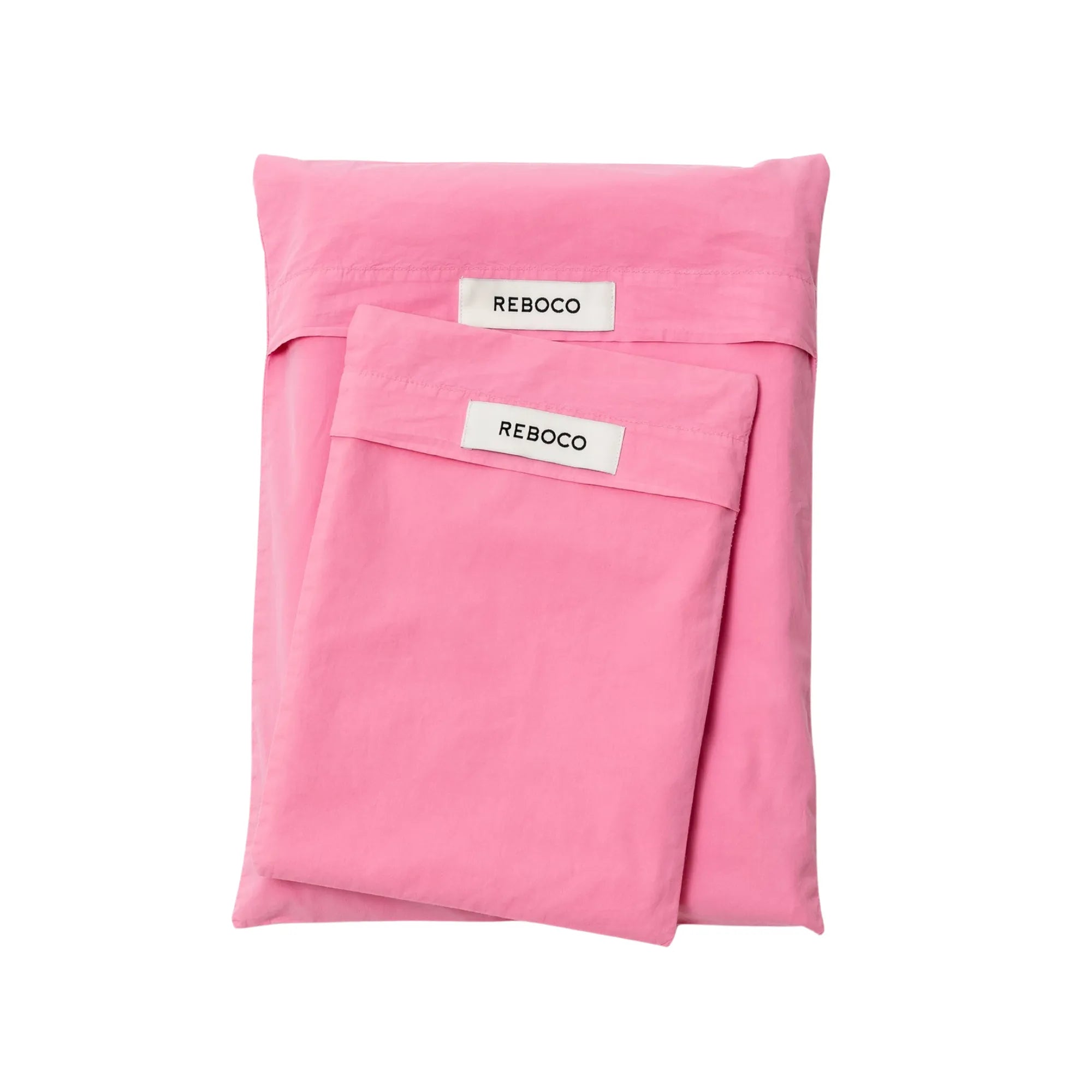 Bubblegum Cotton Percale Bedding set displayed on a cozy bed with matching decor