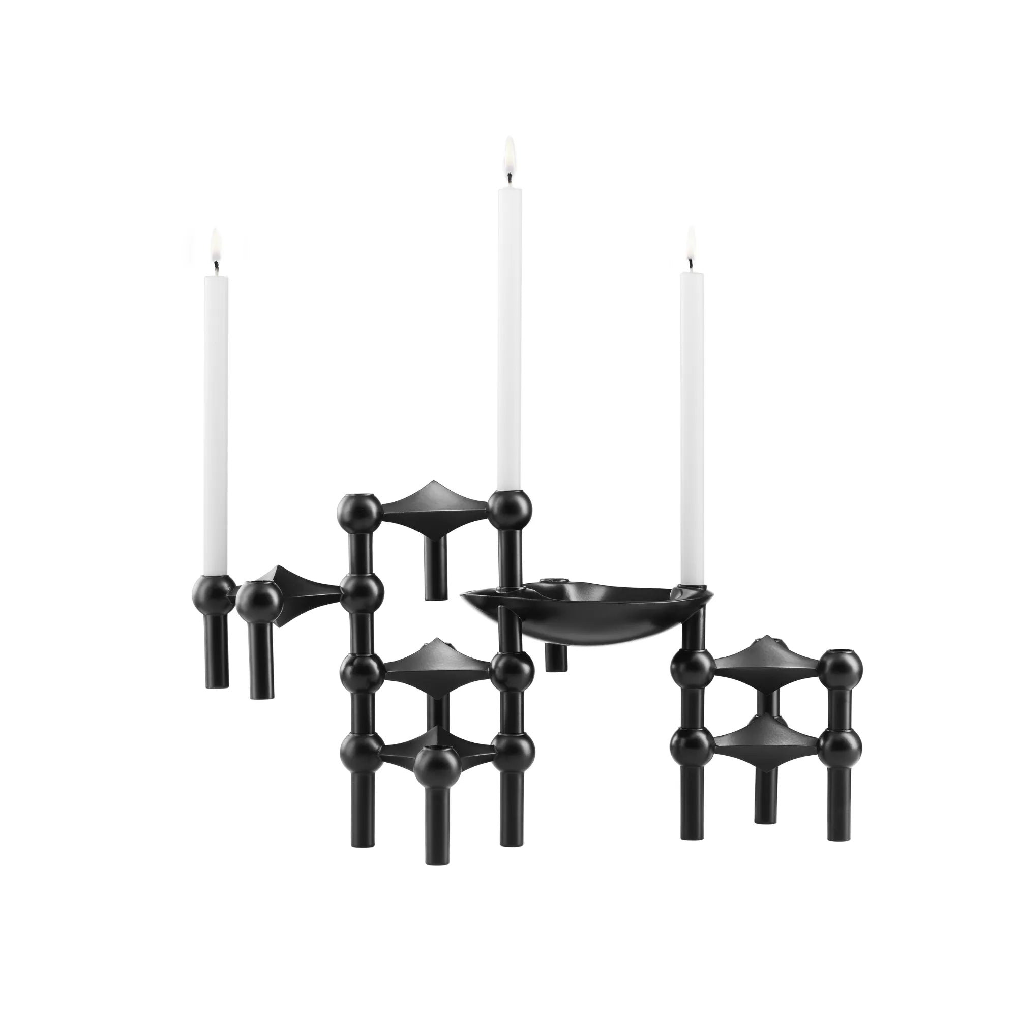 Modular black candle holder with three connected cylindrical pieces on white background