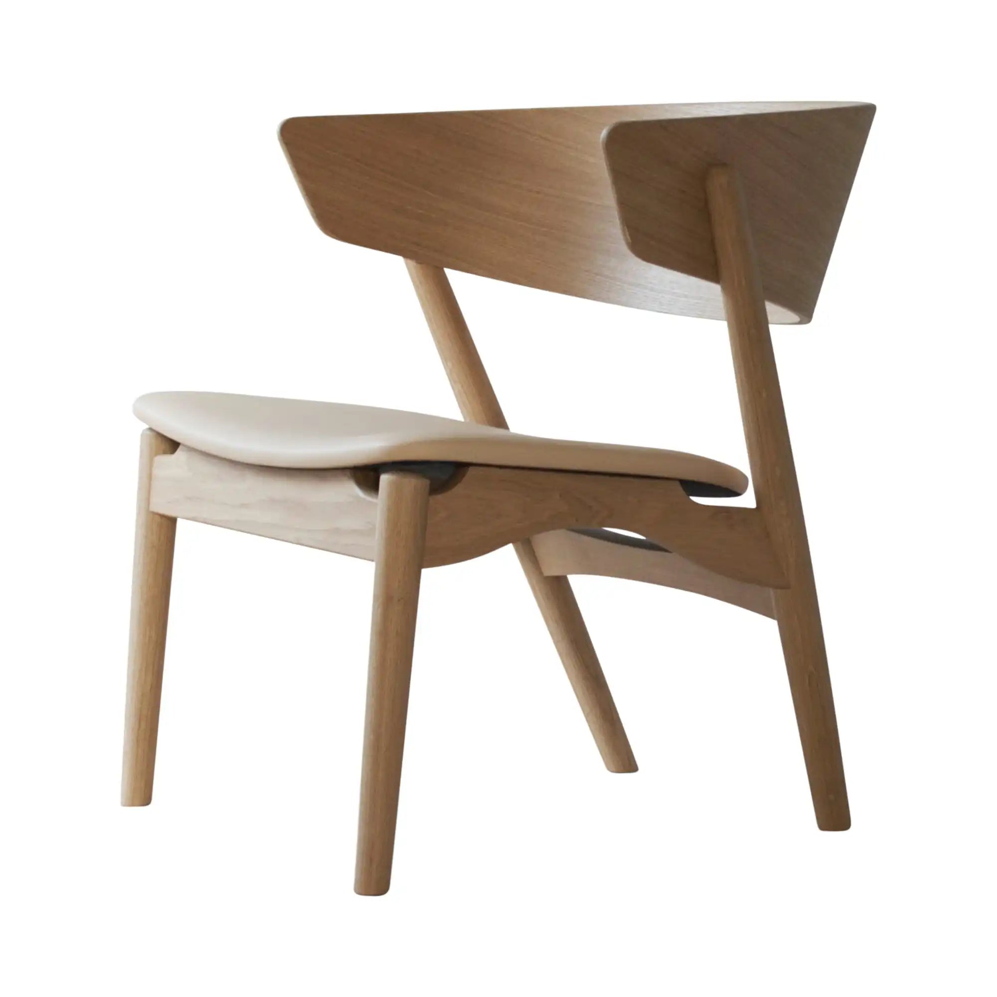 A sleek and modern No 7 Lounge Chair with comfortable cushioning and stylish design for ultimate relaxation