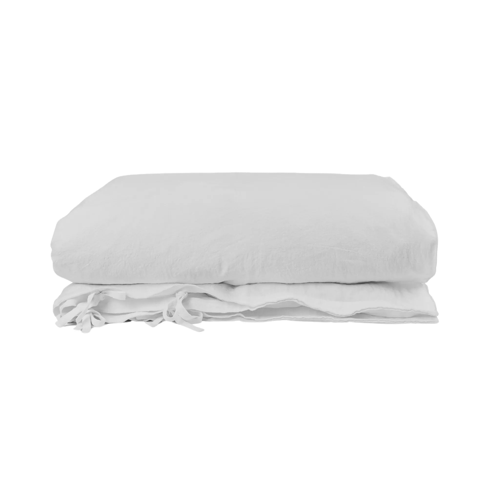  Merrow Duvet Cover draping gracefully over a plush, inviting bed for relaxation 