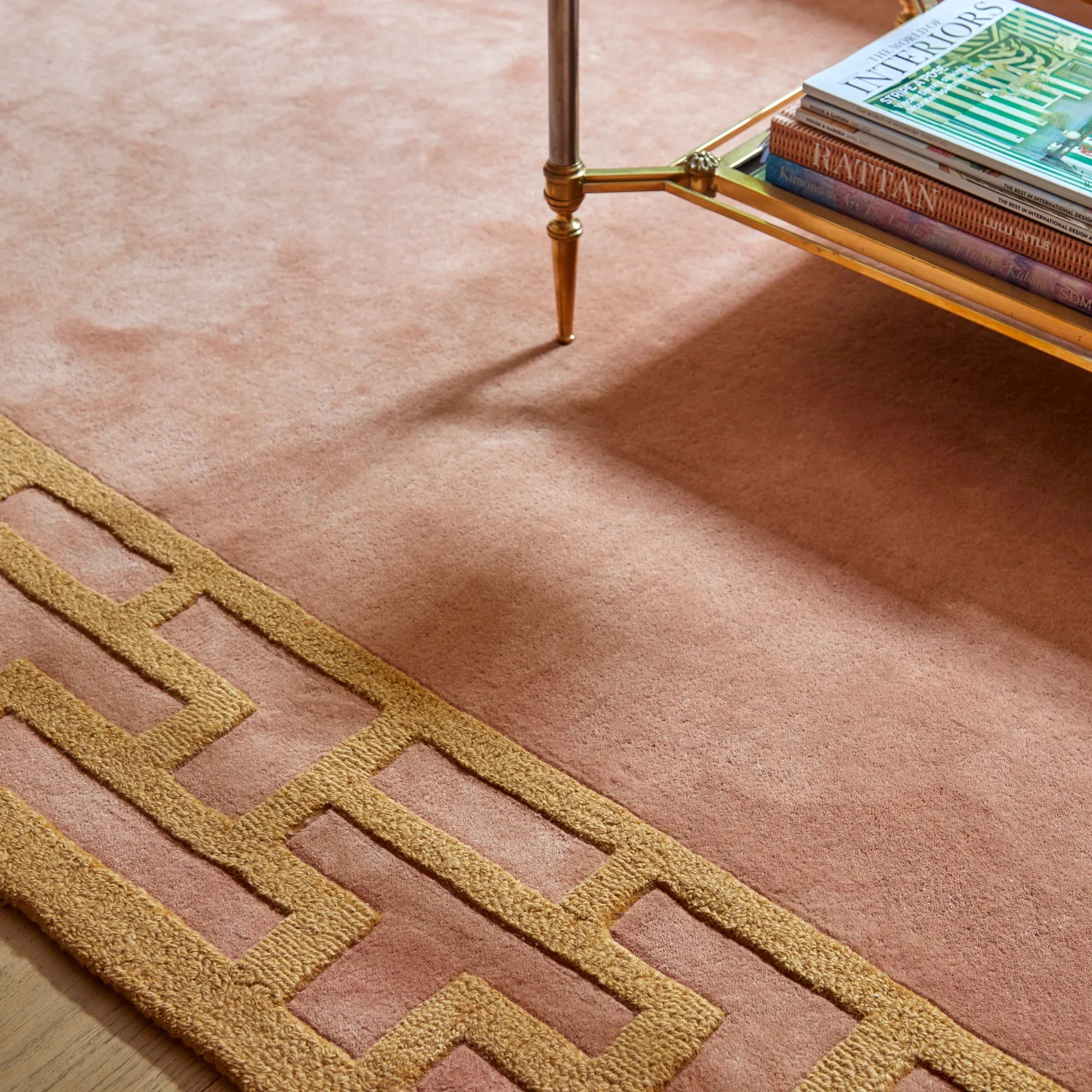 Handwoven Indocine Wool Rug in rich earth tones, perfect for cozy living rooms