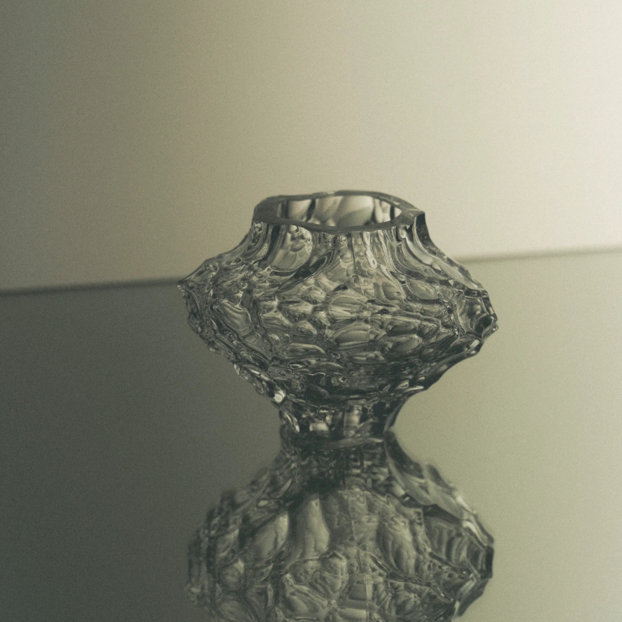  Close up of Canyon Vase - Mini showcasing its unique geometric design and texture