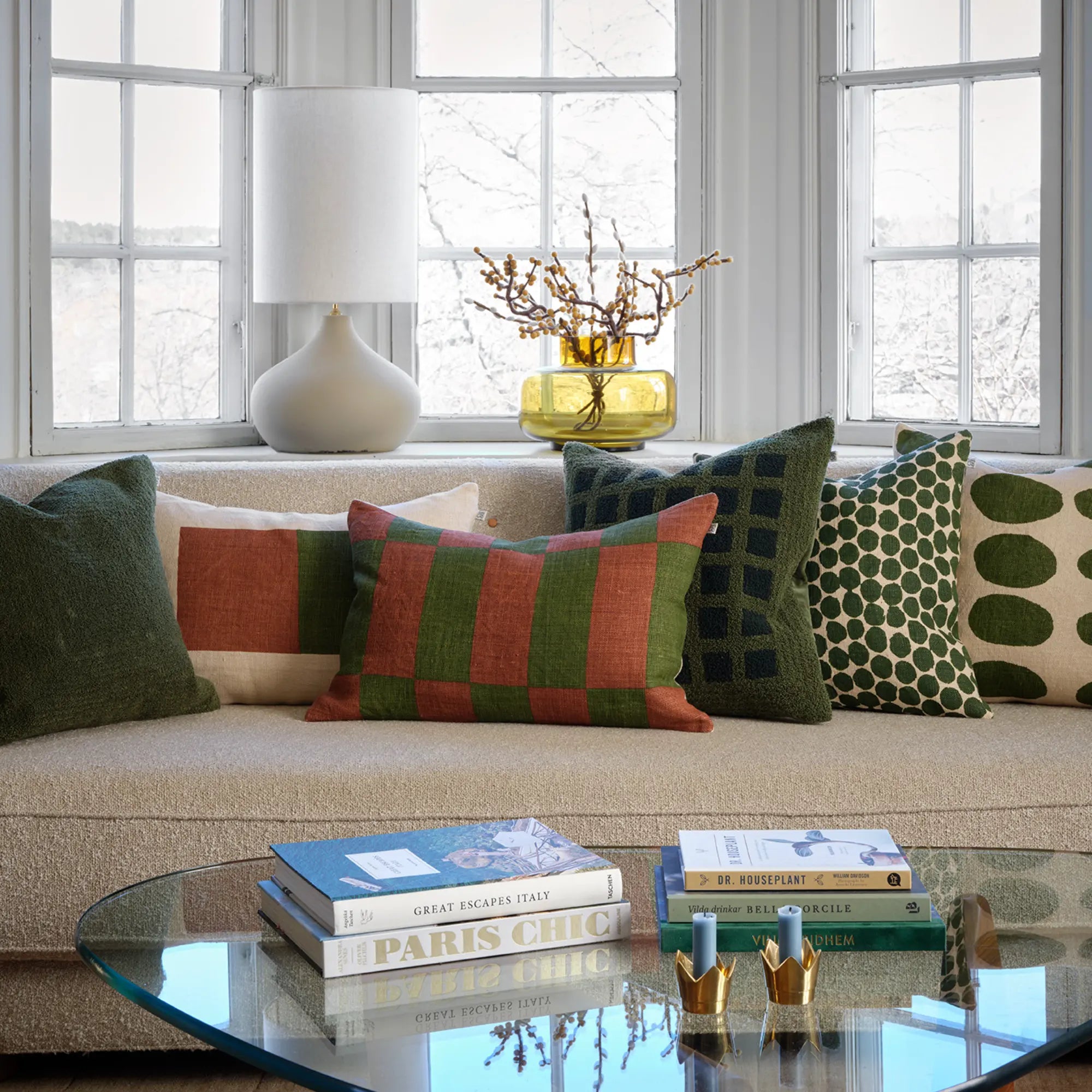 Samar Linen Cushion in soft beige color with intricate embroidery detail and tassels 
