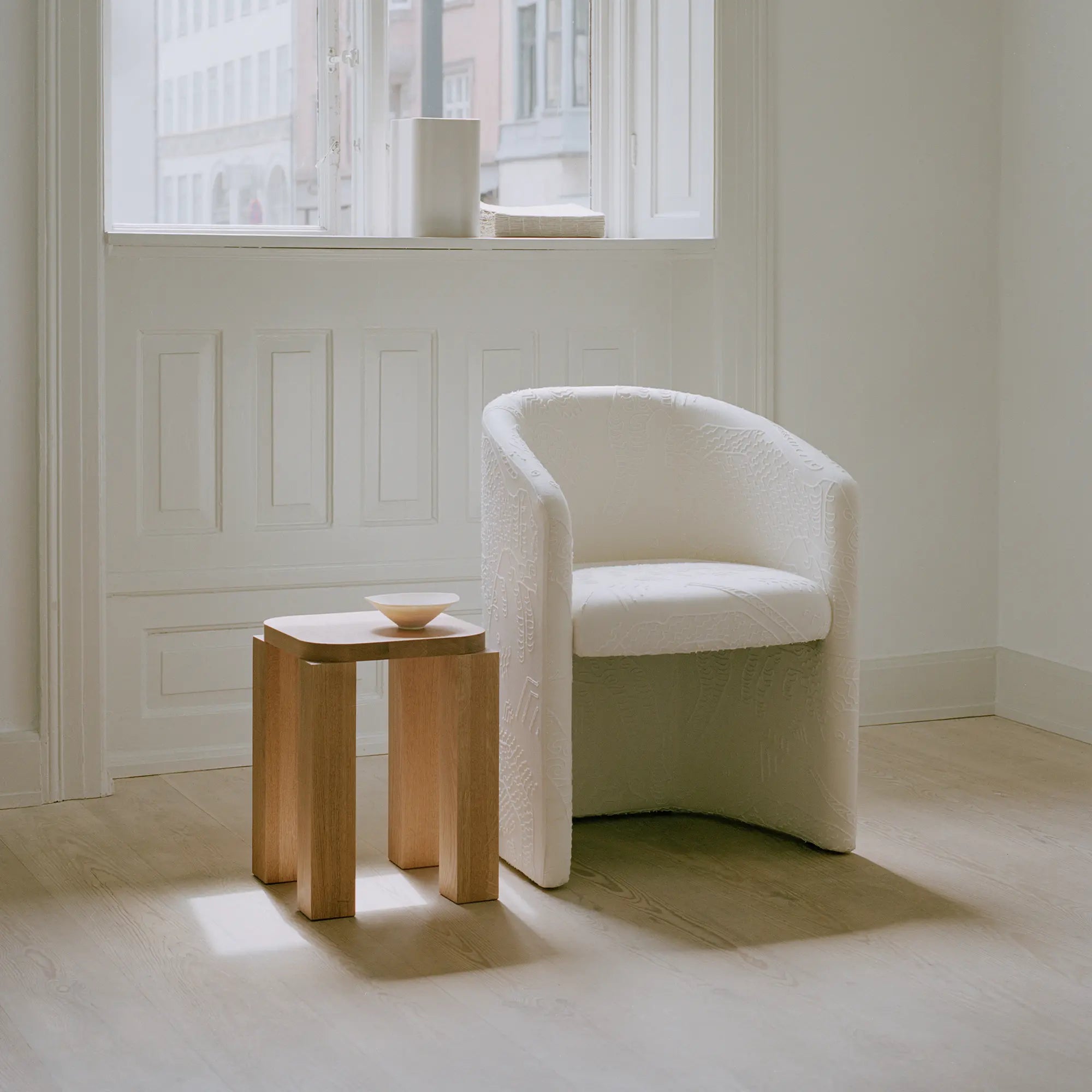 Elegant and stylish Covent Club Chair in a neutral tone with tapered legs