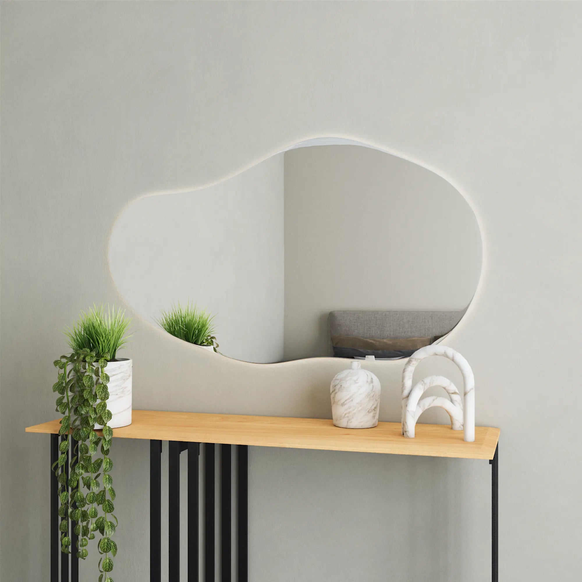  Cloud Mirror with Lights illuminating a contemporary vanity area