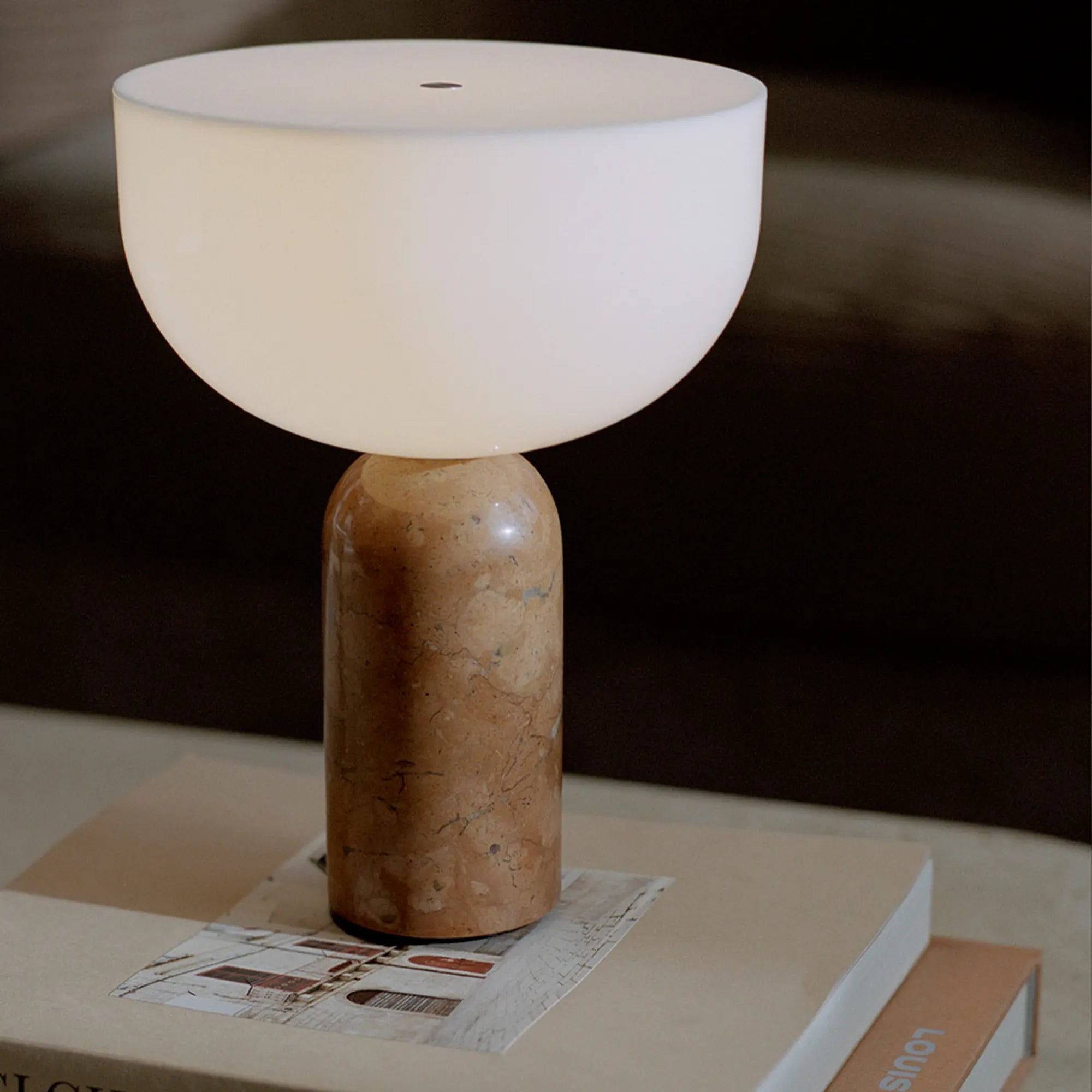 Sleek Kizu Portable Table Lamp with soft, diffuse glow