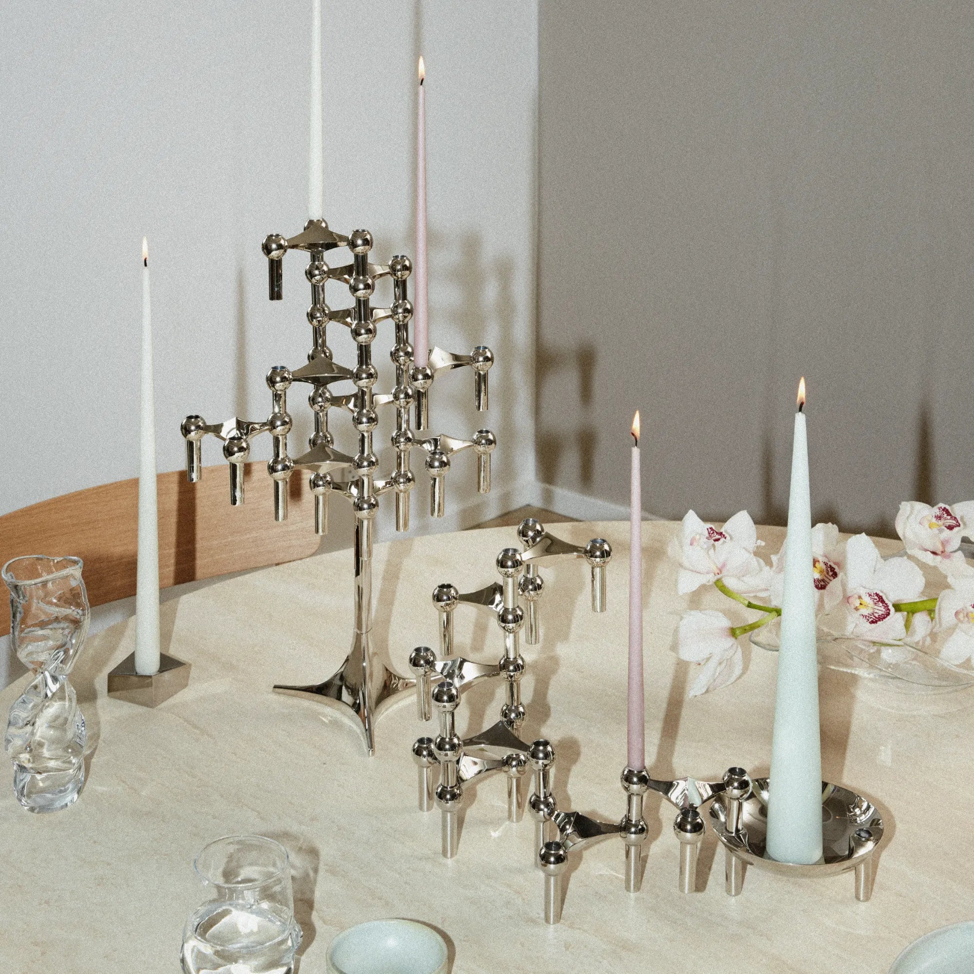 An elegant and stylish metal candle holder stand with intricate design