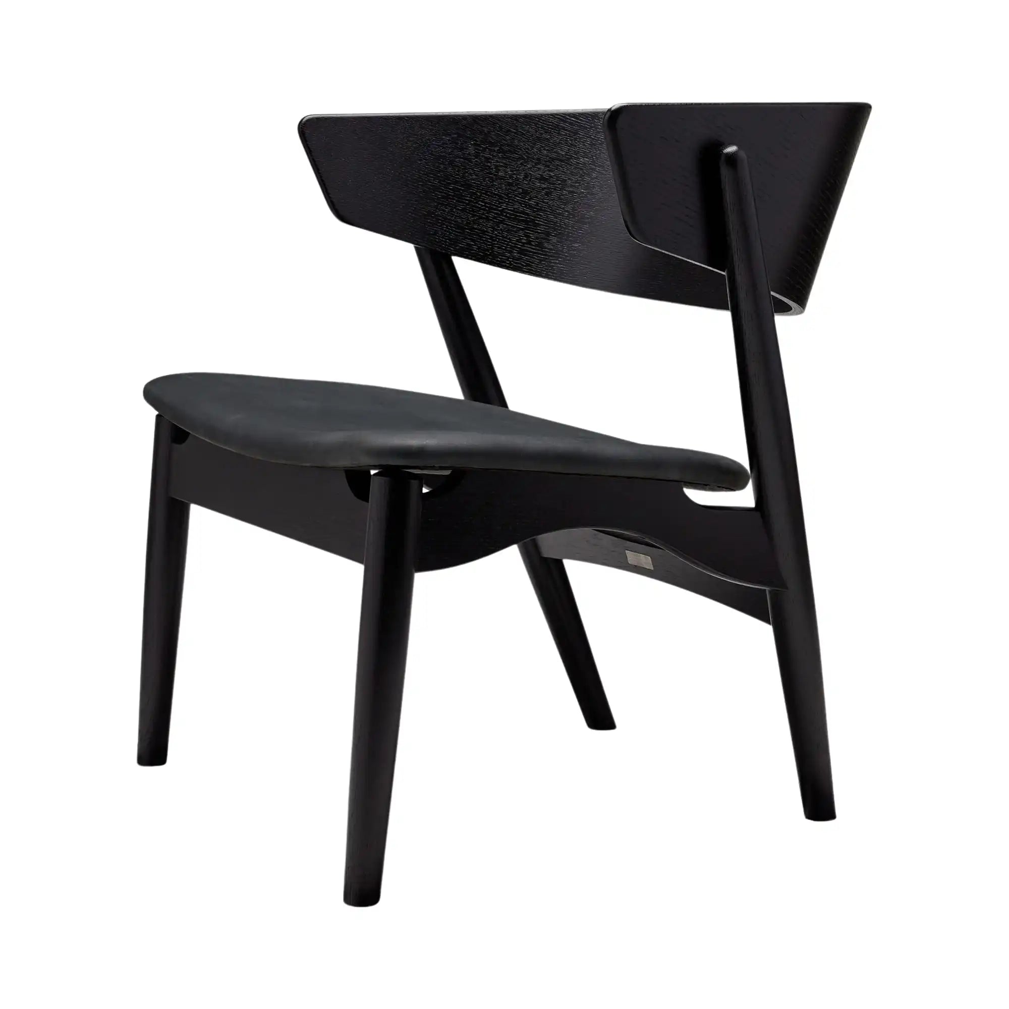 Modern and stylish No 7 Lounge Chair in black leather with wooden frame and cushioned seat