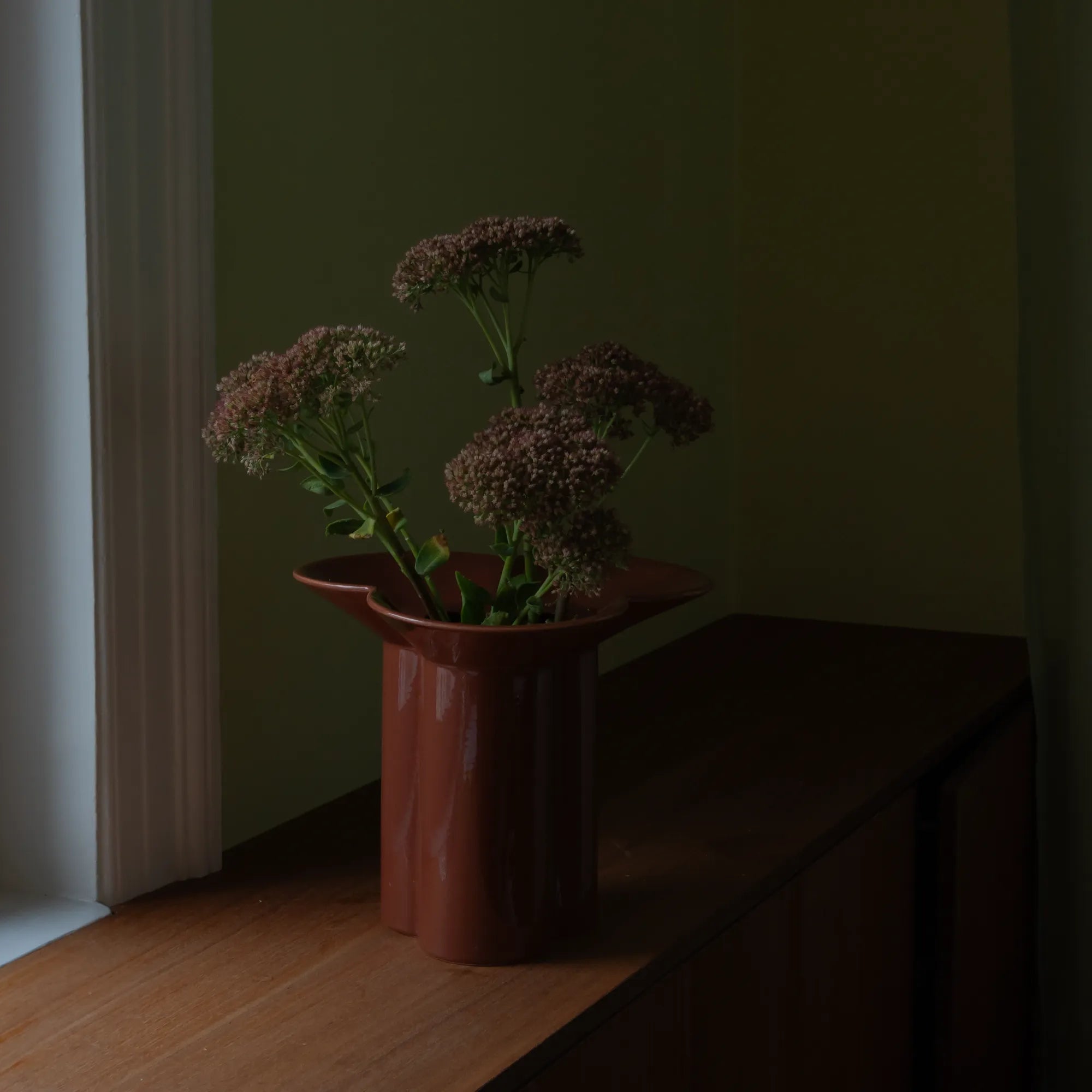 Beautiful handcrafted ceramic Clover Vase in stunning emerald green color