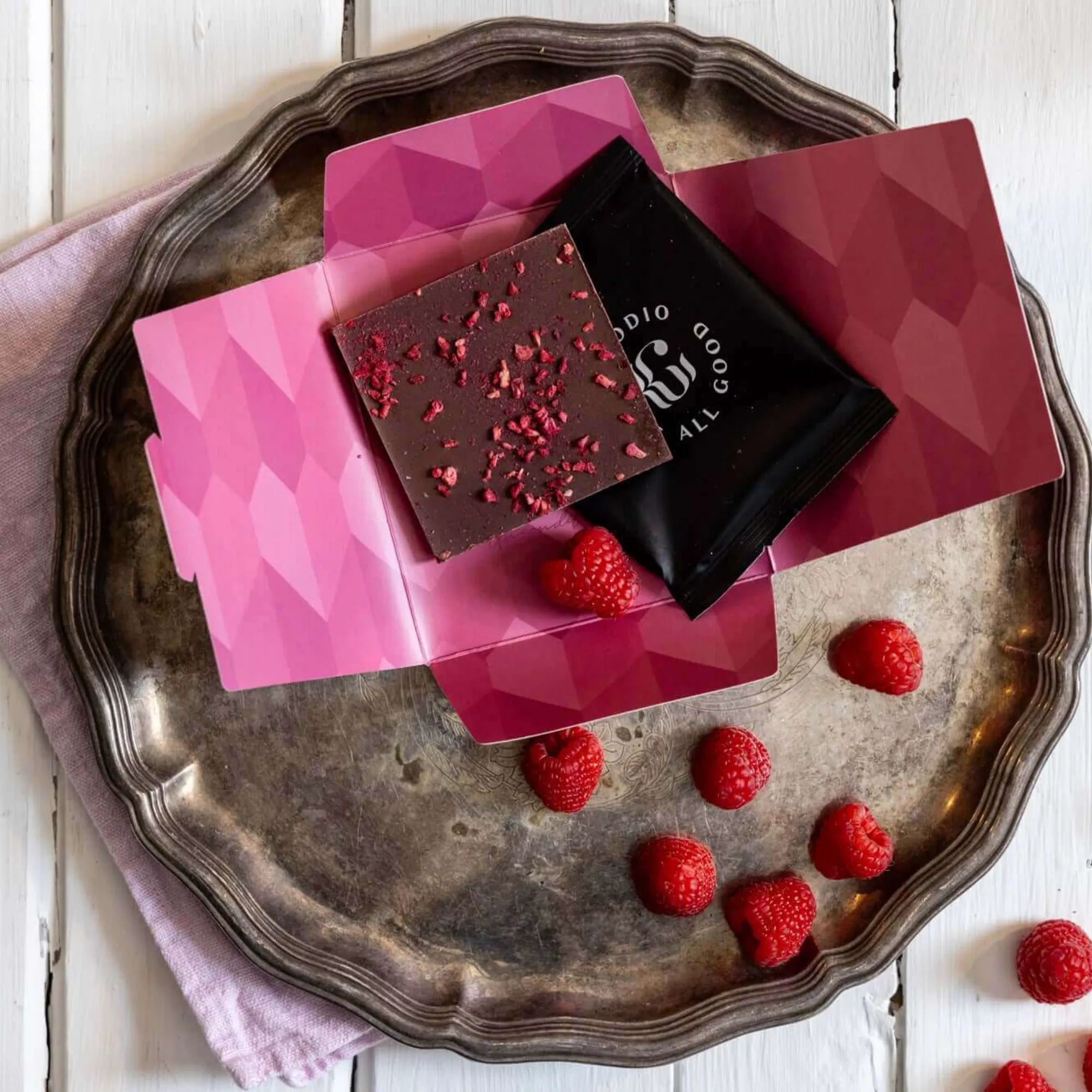 Handcrafted artisan chocolate bar with 49% cacao and fruit infusion