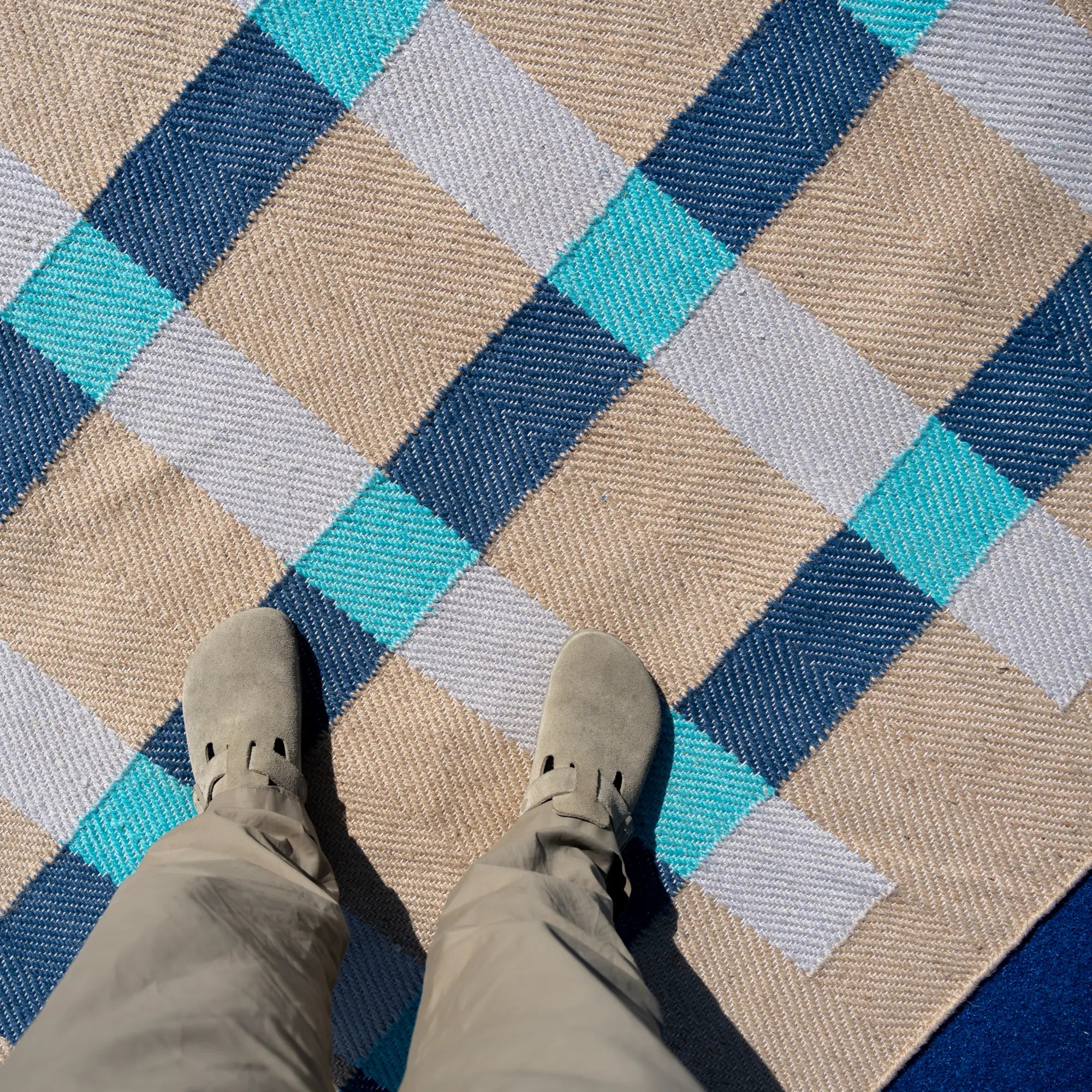  Jute floor covering with a sophisticated navy and natural stripe