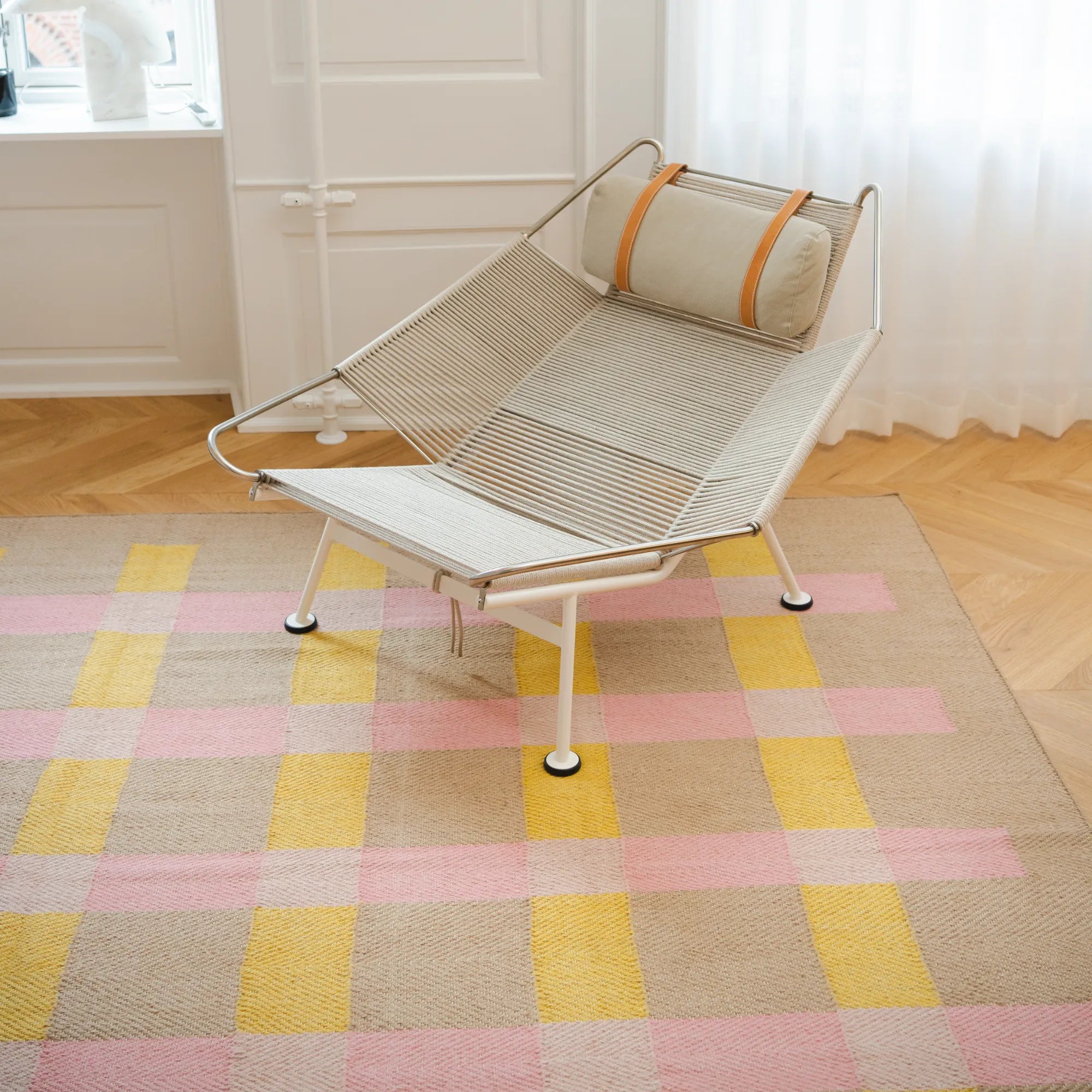 Natural fiber area rug with striped pattern in beige and brown