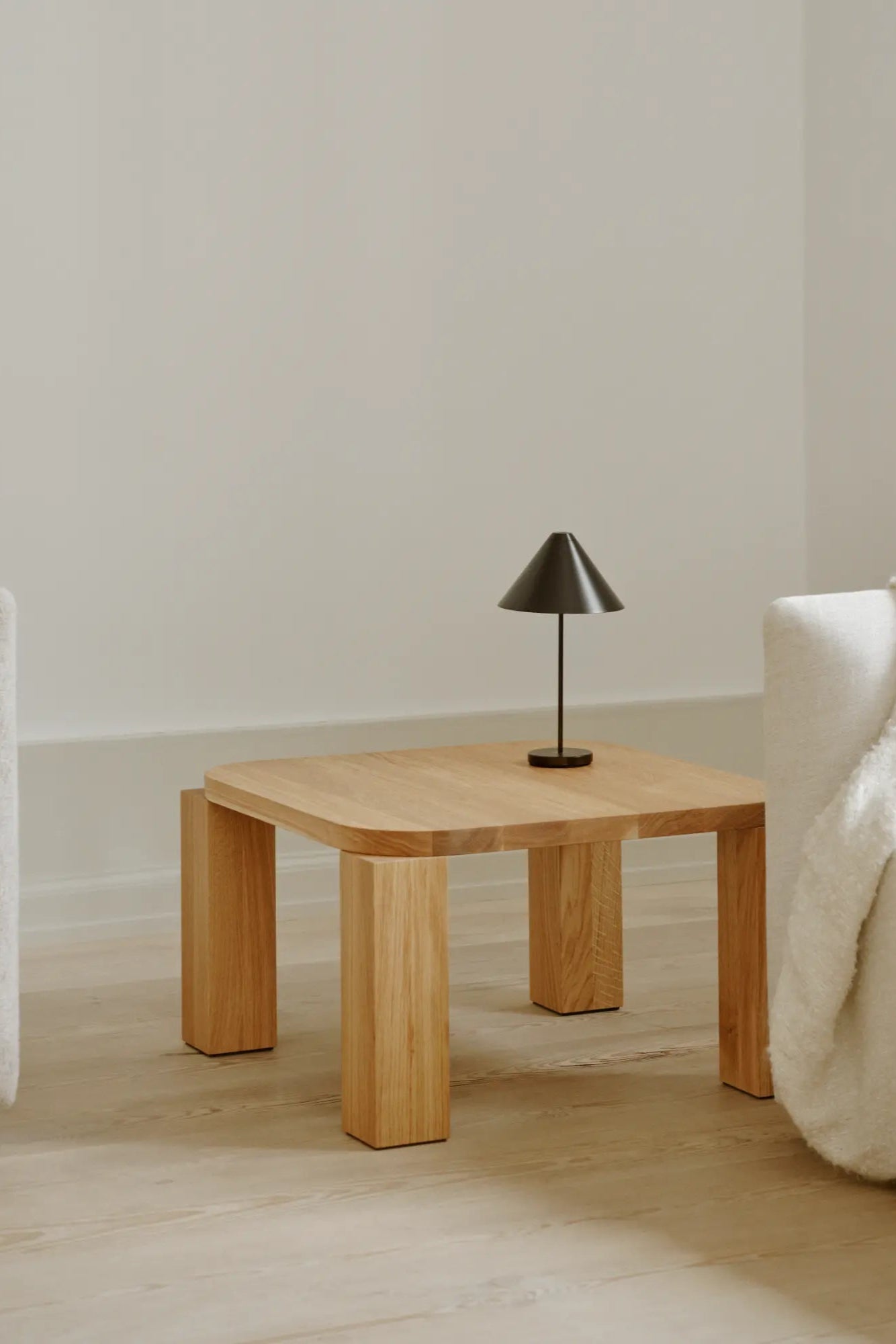 Modern square coffee table with spacious tabletop and sleek design