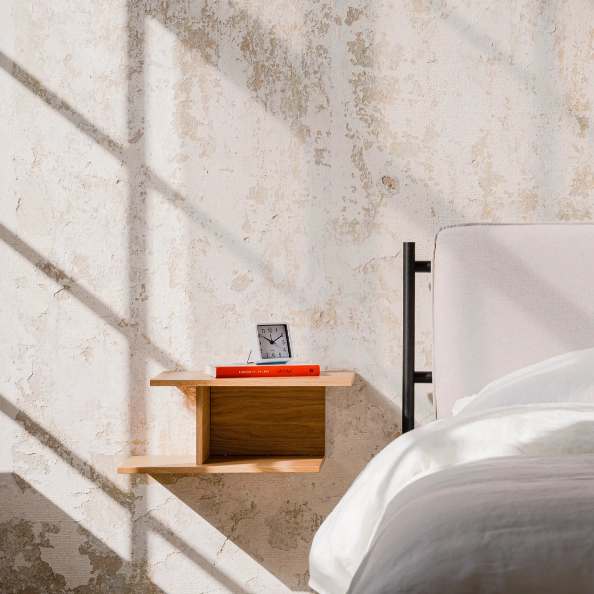 Tann Bedside Shelf with a modern and minimalist design, adding functionality to any bedroom