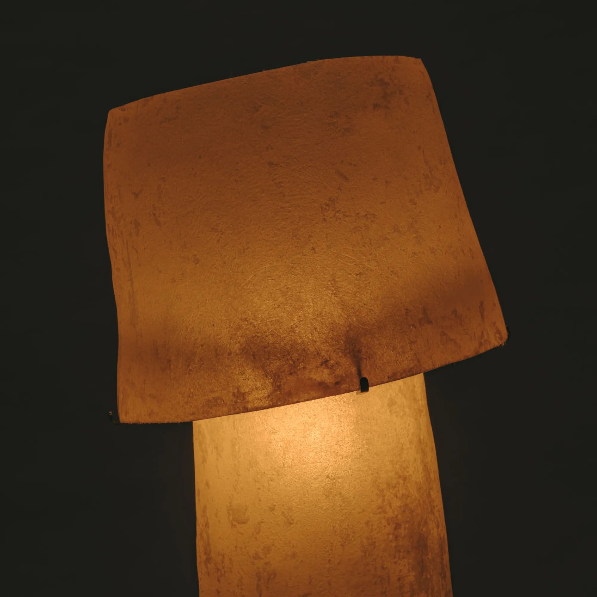 The ”Mush” Lamp (Tower) displayed on a sleek wooden table