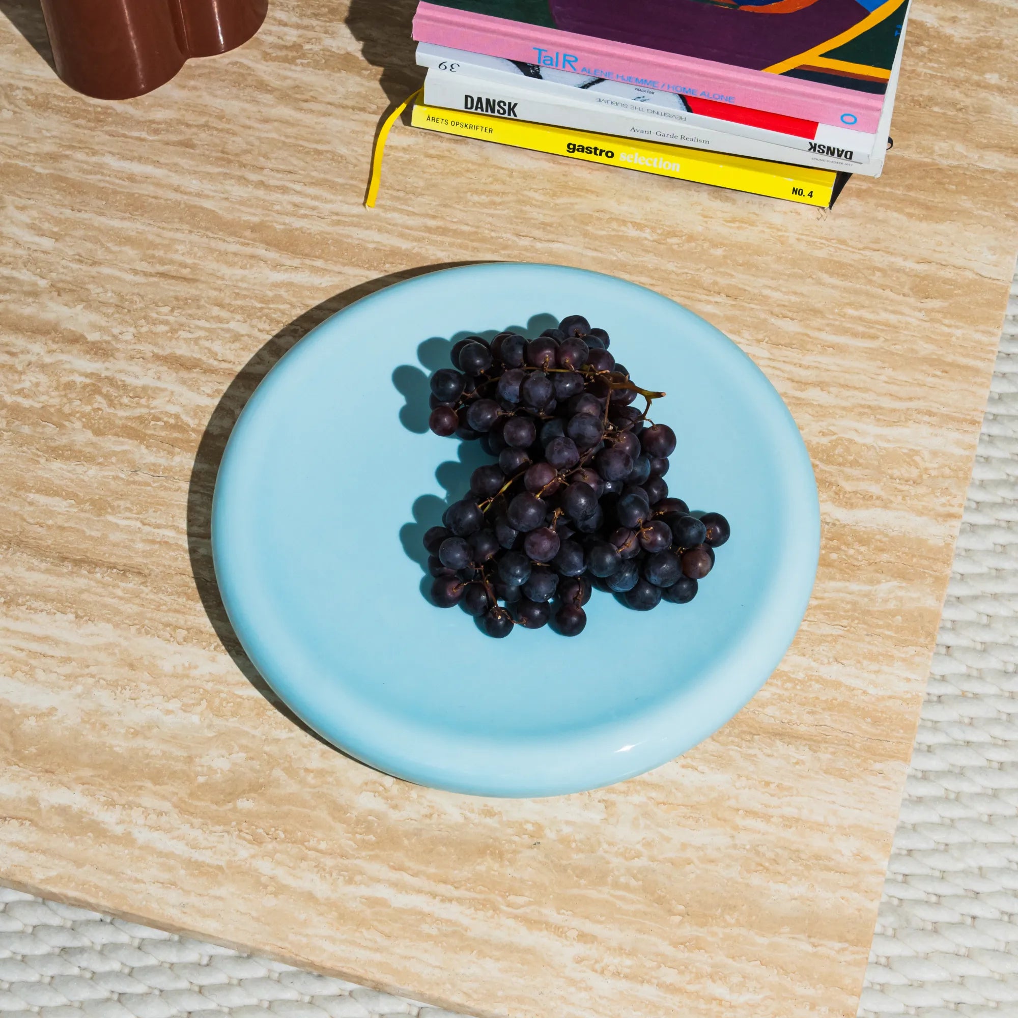 Big O Plate with blue geometric pattern on white background